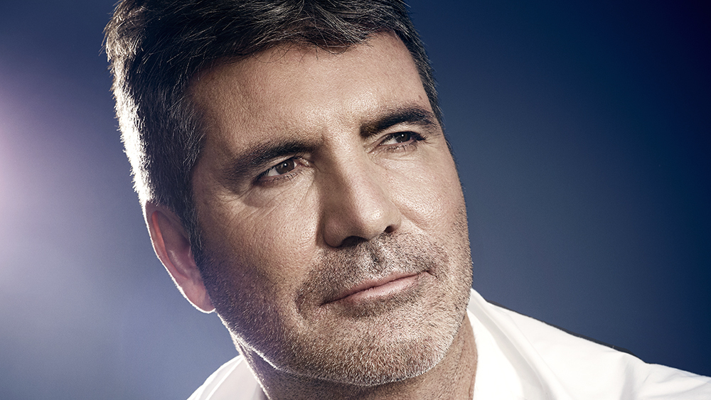Simon Cowell Hospitalized After Breaking His Back in Bike Accident