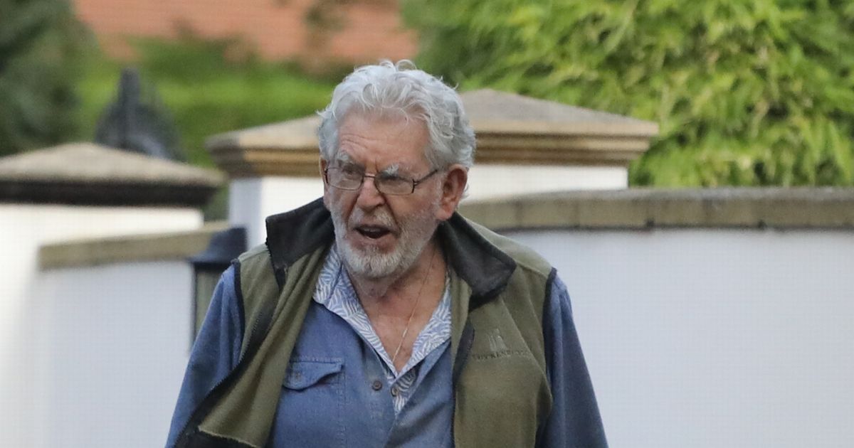 Paedophile Rolf Harris snapped for first time since turning 90 as he takes dog for walk