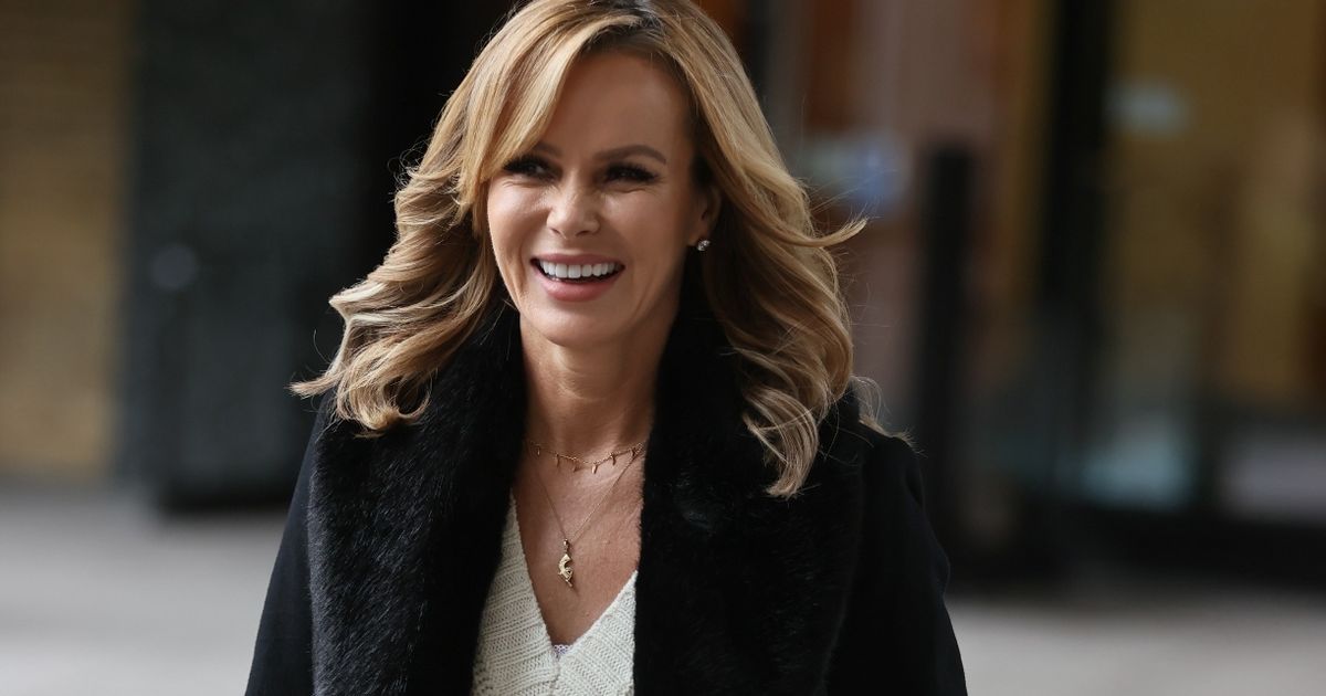 Amanda Holden hides her killer physique under jumper after BGT dress sparks complaints