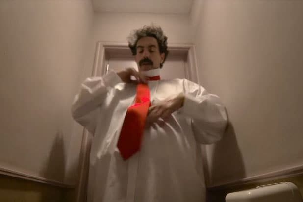 ‘Borat’ Sequel Trailer: Sacha Baron Cohen Crashes CPAC Convention Dressed as Trump (Video)