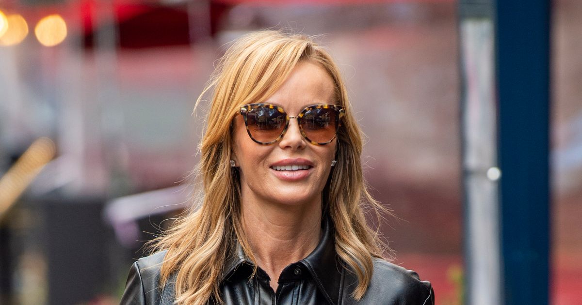 Amanda Holden oozes class as she shows off age-defying body in skintight leather dress