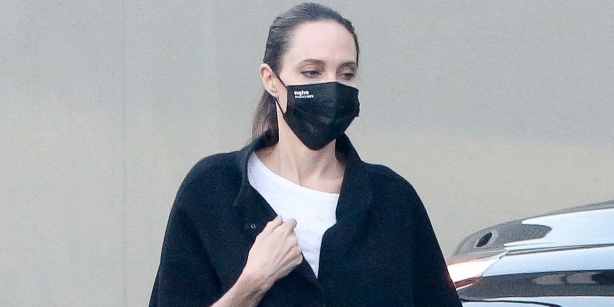 Angelina Jolie Rocks Black Leather Knee-High Boots for a Shopping Trip with Knox Jolie-Pitt