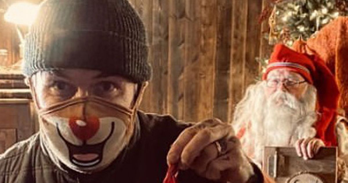 David Beckham jokes about his ‘golden balls’ as he jangles them with Santa Claus