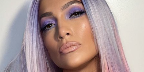 J.Lo Has a “Unicorn Barbie” Moment in a Long Multicolored Wig and a Silky Dress