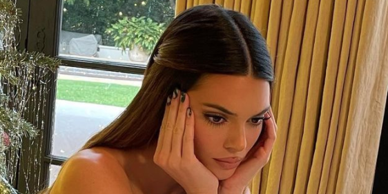 Kendall Jenner Dressed Like a Sexy Gold Present for Christmas Eve