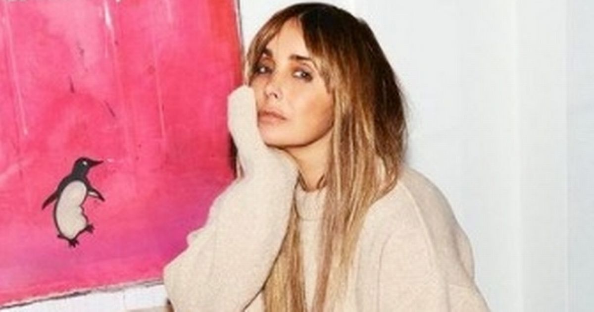 Louise Redknapp glams up for snap after her cryptic post with a love poem