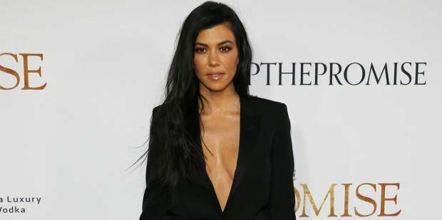 Was Kourtney Kardashian Photoshopped Into The Newest Family Photo? See The Pic That Has Fans Convinced