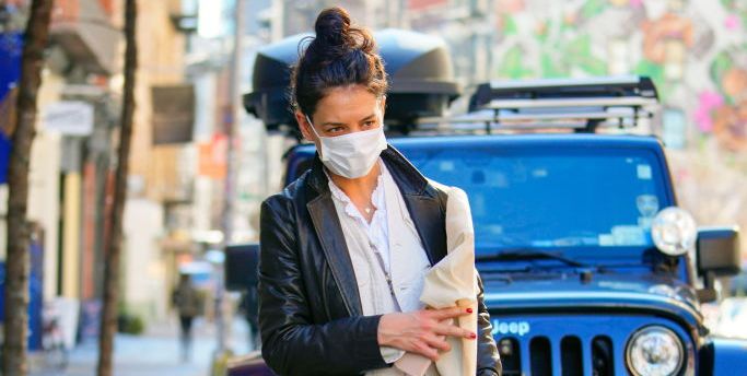 Katie Holmes Pairs a Light Khaki Suit with a Sleek Leather Trench for an NYC Outing
