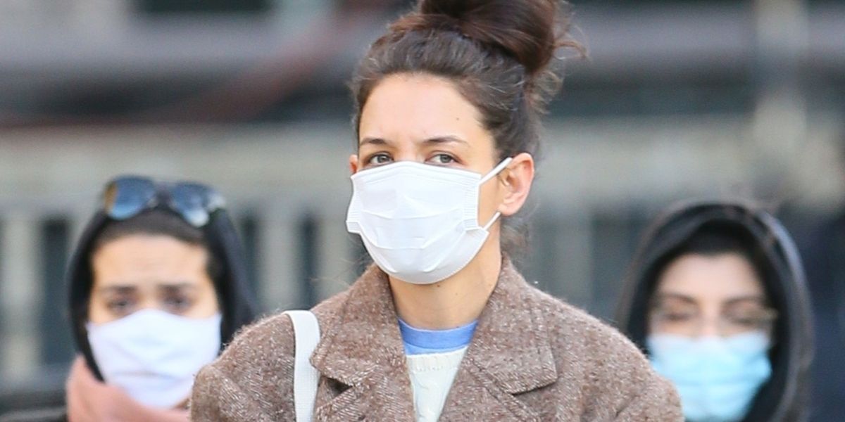 Katie Holmes Pairs Washed-Out Denim with Velcro Sneakers and a Cozy Winter Coat
