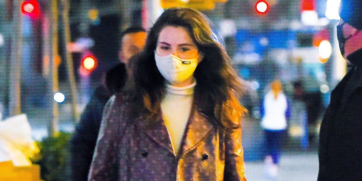 Selena Gomez Went Shopping in a Chic Louis Vuitton Trench Coat, High Waist Jeans, and a Turtleneck