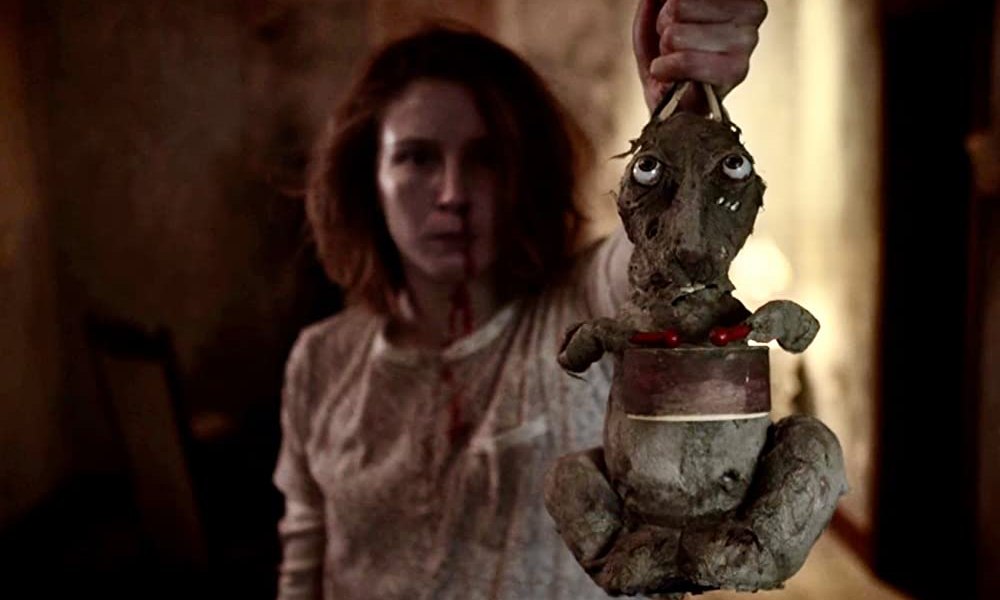 [Panic Fest Review] Psychological Chiller ‘Caveat’ Favors Bizarre Atmosphere and Claustrophobic Dread